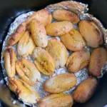 Golden baked plantains cooked in air fryer on foil