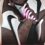 Contemporary sneakers with ornament detail in box, top view