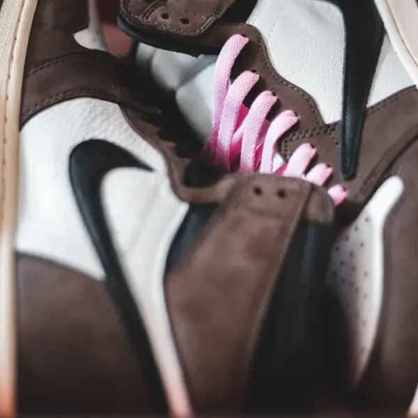 Contemporary sneakers with ornament detail in box, top view